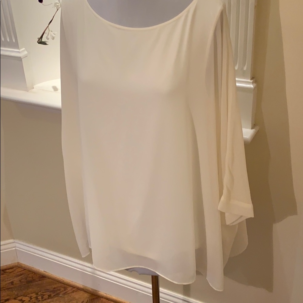 Stunning cream raglan sleeve blouse